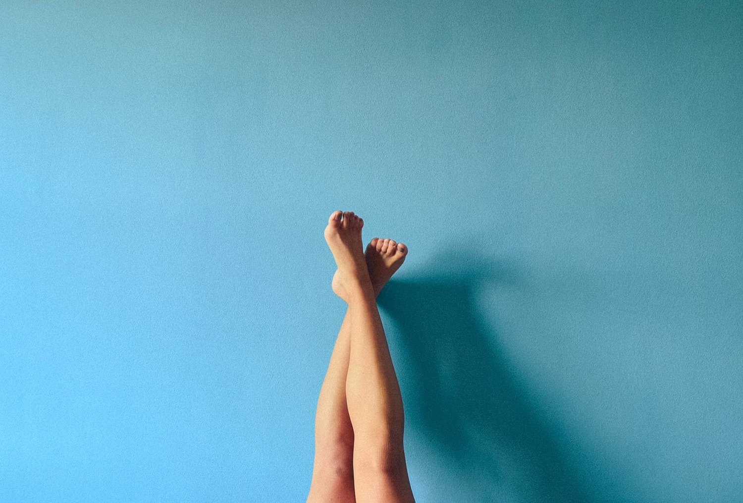 Woman's legs after laser hair removal